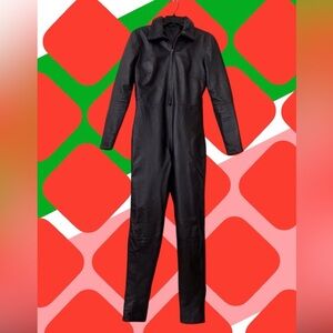 “I Can’t Reach” Black Leather Catsuit